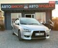 Серый Мицубиси Лансер, объемом двигателя 2 л и пробегом 186 тыс. км за 6999 $, фото 1 на Automoto.ua