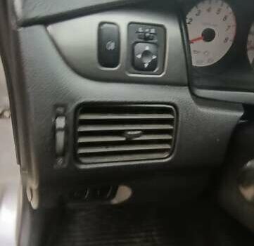 Сірий Міцубісі Lancer, об'ємом двигуна 1.6 л та пробігом 176 тис. км за 4999 $, фото 20 на Automoto.ua