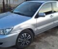 Сірий Міцубісі Lancer, об'ємом двигуна 1.6 л та пробігом 91 тис. км за 6300 $, фото 3 на Automoto.ua