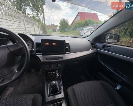 Серый Мицубиси Лансер, объемом двигателя 1.5 л и пробегом 78 тыс. км за 7600 $, фото 9 на Automoto.ua