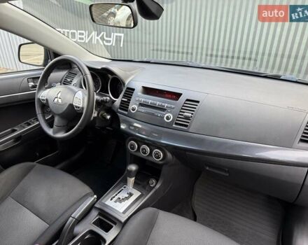 Серый Мицубиси Лансер, объемом двигателя 2 л и пробегом 230 тыс. км за 6900 $, фото 26 на Automoto.ua