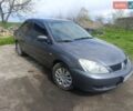 Сірий Міцубісі Lancer, об'ємом двигуна 1.6 л та пробігом 430 тис. км за 3000 $, фото 1 на Automoto.ua