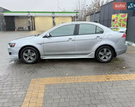 Серый Мицубиси Лансер, объемом двигателя 2 л и пробегом 220 тыс. км за 6500 $, фото 4 на Automoto.ua