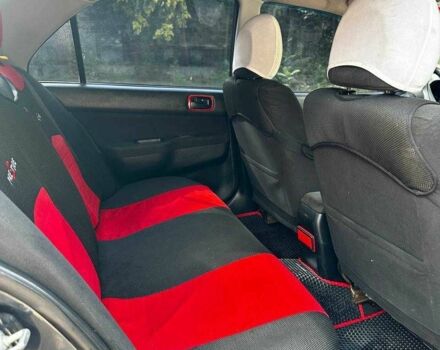 Серый Мицубиси Лансер, объемом двигателя 1.6 л и пробегом 999 тыс. км за 3200 $, фото 3 на Automoto.ua