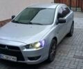 Серый Мицубиси Лансер, объемом двигателя 1.5 л и пробегом 233 тыс. км за 6200 $, фото 1 на Automoto.ua