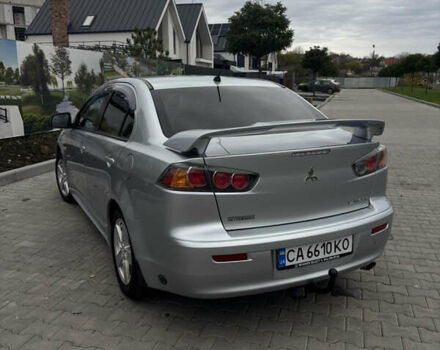 Серый Мицубиси Лансер, объемом двигателя 2 л и пробегом 211 тыс. км за 7100 $, фото 1 на Automoto.ua