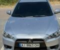 Сірий Міцубісі Lancer, об'ємом двигуна 2 л та пробігом 240 тис. км за 6650 $, фото 1 на Automoto.ua