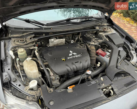 Сірий Міцубісі Lancer, об'ємом двигуна 2 л та пробігом 92 тис. км за 8200 $, фото 45 на Automoto.ua