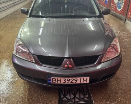 Серый Мицубиси Лансер, объемом двигателя 1.6 л и пробегом 268 тыс. км за 4600 $, фото 1 на Automoto.ua