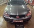 Серый Мицубиси Лансер, объемом двигателя 1.6 л и пробегом 268 тыс. км за 4600 $, фото 1 на Automoto.ua