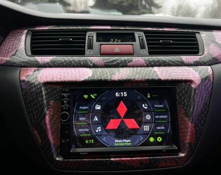 Серый Мицубиси Лансер, объемом двигателя 1.6 л и пробегом 205 тыс. км за 5400 $, фото 10 на Automoto.ua