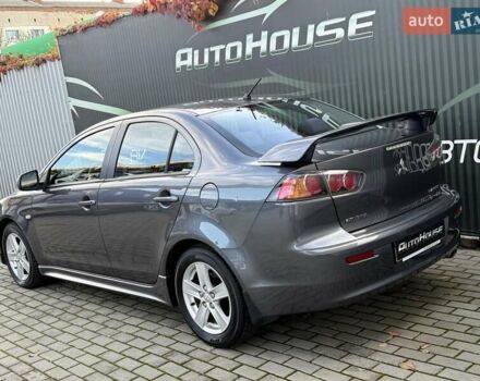 Серый Мицубиси Лансер, объемом двигателя 2 л и пробегом 230 тыс. км за 6900 $, фото 13 на Automoto.ua