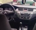 Сірий Міцубісі Lancer, об'ємом двигуна 1.6 л та пробігом 244 тис. км за 5500 $, фото 3 на Automoto.ua