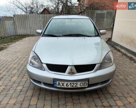 Серый Мицубиси Лансер, объемом двигателя 1.58 л и пробегом 185 тыс. км за 4700 $, фото 2 на Automoto.ua