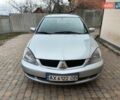Серый Мицубиси Лансер, объемом двигателя 1.58 л и пробегом 185 тыс. км за 4700 $, фото 2 на Automoto.ua