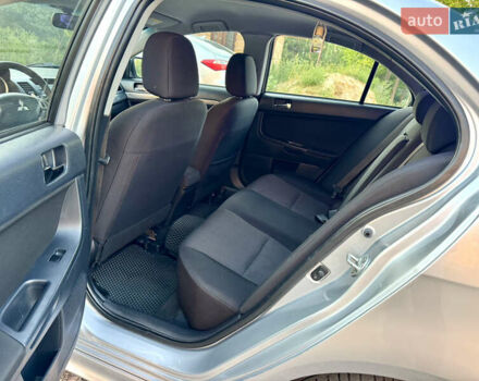 Сірий Міцубісі Lancer, об'ємом двигуна 2 л та пробігом 223 тис. км за 7390 $, фото 12 на Automoto.ua