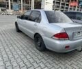 Сірий Міцубісі Lancer, об'ємом двигуна 1.6 л та пробігом 260 тис. км за 4200 $, фото 4 на Automoto.ua