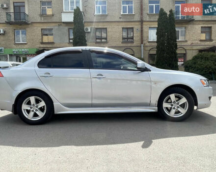 Серый Мицубиси Лансер, объемом двигателя 2 л и пробегом 265 тыс. км за 5500 $, фото 3 на Automoto.ua