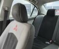 Серый Мицубиси Лансер, объемом двигателя 2 л и пробегом 273 тыс. км за 5500 $, фото 2 на Automoto.ua