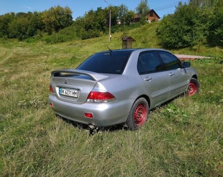 Серый Мицубиси Лансер, объемом двигателя 1.6 л и пробегом 350 тыс. км за 3600 $, фото 5 на Automoto.ua