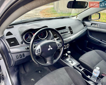 Сірий Міцубісі Lancer, об'ємом двигуна 2 л та пробігом 225 тис. км за 6890 $, фото 9 на Automoto.ua