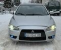 Серый Мицубиси Лансер, объемом двигателя 2 л и пробегом 239 тыс. км за 5500 $, фото 1 на Automoto.ua