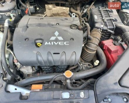 Серый Мицубиси Лансер, объемом двигателя 2 л и пробегом 103 тыс. км за 7700 $, фото 9 на Automoto.ua