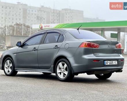 Серый Мицубиси Лансер, объемом двигателя 2 л и пробегом 203 тыс. км за 4999 $, фото 4 на Automoto.ua