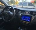 Серый Мицубиси Лансер, объемом двигателя 1.58 л и пробегом 150 тыс. км за 5200 $, фото 6 на Automoto.ua