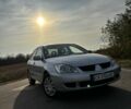 Серый Мицубиси Лансер, объемом двигателя 1.6 л и пробегом 228 тыс. км за 4500 $, фото 1 на Automoto.ua