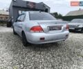 Сірий Міцубісі Lancer, об'ємом двигуна 1.6 л та пробігом 240 тис. км за 2999 $, фото 1 на Automoto.ua