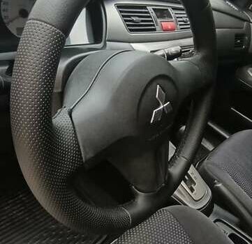Сірий Міцубісі Lancer, об'ємом двигуна 1.6 л та пробігом 176 тис. км за 4999 $, фото 18 на Automoto.ua