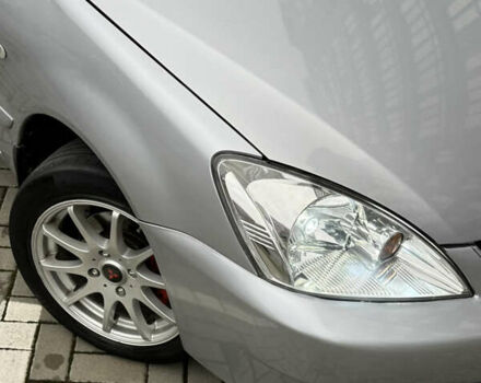 Сірий Міцубісі Lancer, об'ємом двигуна 1.6 л та пробігом 269 тис. км за 3999 $, фото 4 на Automoto.ua