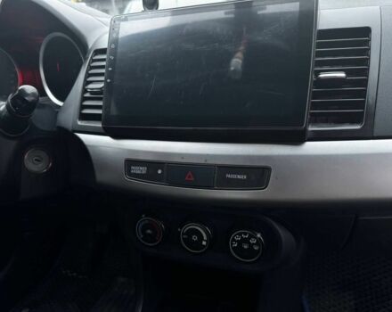 Серый Мицубиси Лансер, объемом двигателя 1.5 л и пробегом 147 тыс. км за 6700 $, фото 14 на Automoto.ua