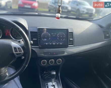 Сірий Міцубісі Lancer, об'ємом двигуна 2 л та пробігом 92 тис. км за 7700 $, фото 5 на Automoto.ua