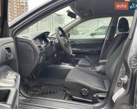 Серый Мицубиси Лансер, объемом двигателя 1.58 л и пробегом 146 тыс. км за 5490 $, фото 8 на Automoto.ua