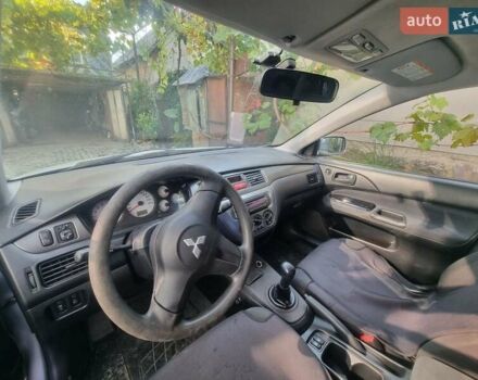 Сірий Міцубісі Lancer, об'ємом двигуна 1.6 л та пробігом 290 тис. км за 3850 $, фото 3 на Automoto.ua