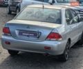 Серый Мицубиси Лансер, объемом двигателя 1.6 л и пробегом 155 тыс. км за 5200 $, фото 7 на Automoto.ua