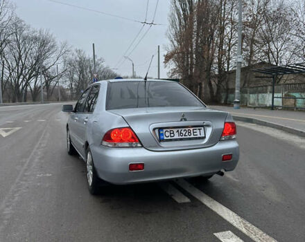 Сірий Міцубісі Lancer, об'ємом двигуна 1.58 л та пробігом 180 тис. км за 3900 $, фото 1 на Automoto.ua