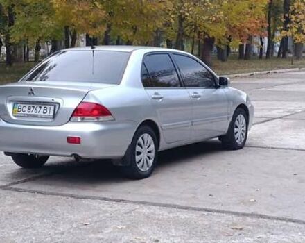 Сірий Міцубісі Lancer, об'ємом двигуна 1.6 л та пробігом 176 тис. км за 4999 $, фото 15 на Automoto.ua