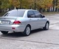 Сірий Міцубісі Lancer, об'ємом двигуна 1.6 л та пробігом 176 тис. км за 4999 $, фото 15 на Automoto.ua