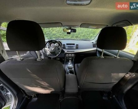 Серый Мицубиси Лансер, объемом двигателя 2 л и пробегом 112 тыс. км за 7900 $, фото 24 на Automoto.ua