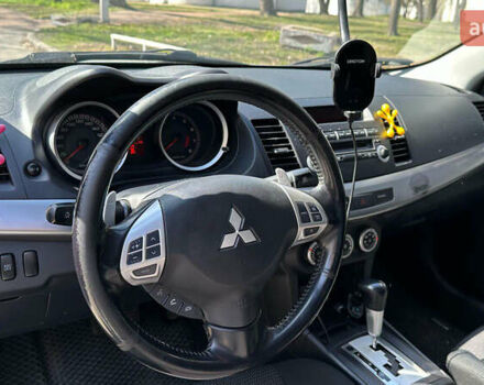 Сірий Міцубісі Lancer, об'ємом двигуна 1.8 л та пробігом 255 тис. км за 6999 $, фото 7 на Automoto.ua