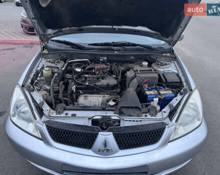 Серый Мицубиси Лансер, объемом двигателя 1.58 л и пробегом 330 тыс. км за 3500 $, фото 5 на Automoto.ua