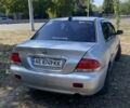 Сірий Міцубісі Lancer, об'ємом двигуна 1.6 л та пробігом 283 тис. км за 2600 $, фото 1 на Automoto.ua