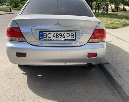 Сірий Міцубісі Lancer, об'ємом двигуна 1.58 л та пробігом 211 тис. км за 4400 $, фото 10 на Automoto.ua