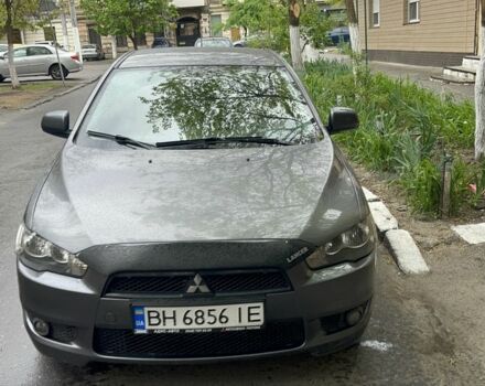 Серый Мицубиси Лансер, объемом двигателя 1.5 л и пробегом 195 тыс. км за 6100 $, фото 1 на Automoto.ua
