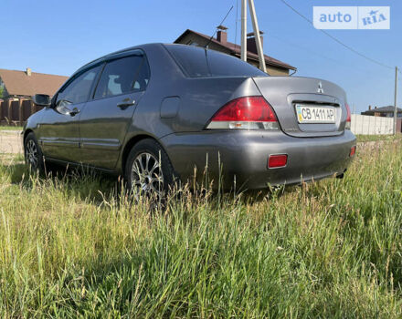 Сірий Міцубісі Lancer, об'ємом двигуна 1.6 л та пробігом 165 тис. км за 5200 $, фото 4 на Automoto.ua