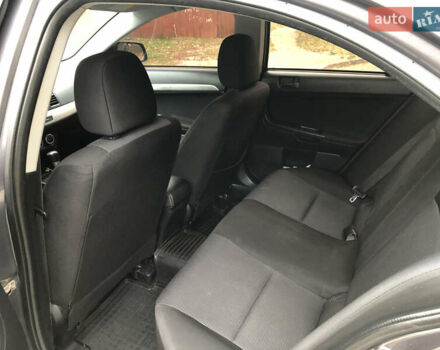 Сірий Міцубісі Lancer, об'ємом двигуна 2 л та пробігом 187 тис. км за 8000 $, фото 19 на Automoto.ua