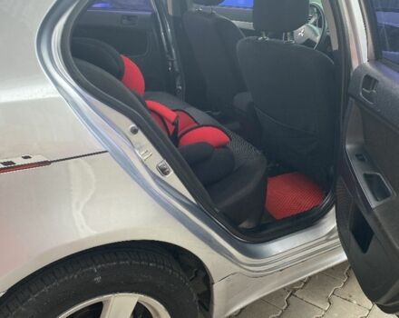 Серый Мицубиси Лансер, объемом двигателя 1.5 л и пробегом 237 тыс. км за 4500 $, фото 9 на Automoto.ua